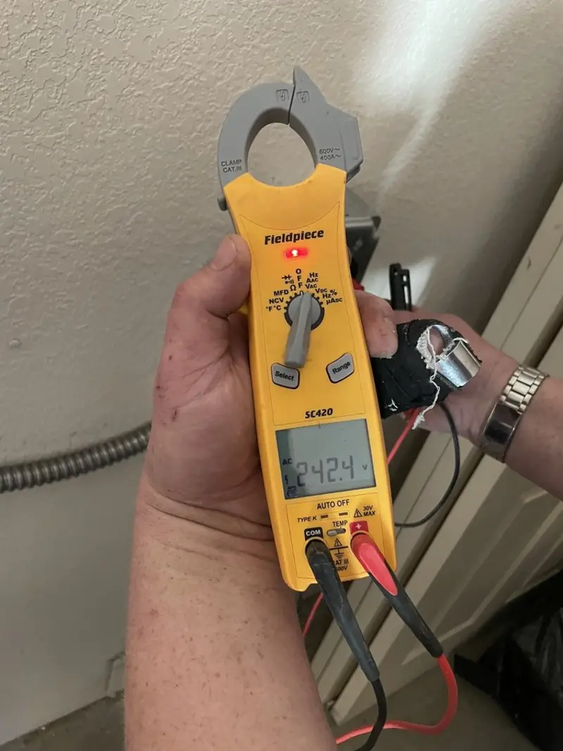 Voltage testing with clamp meter during Generator Installation in Temple City